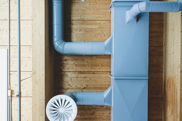 Residential water heater venting and ductwork illustrating location-specific code requirements
